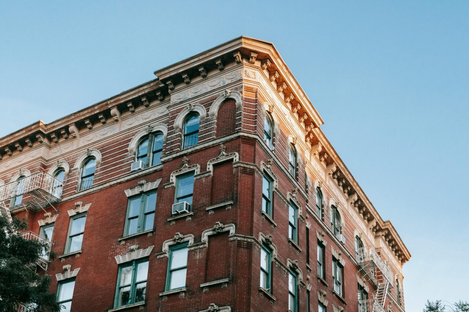 A building with many windows and some balconies